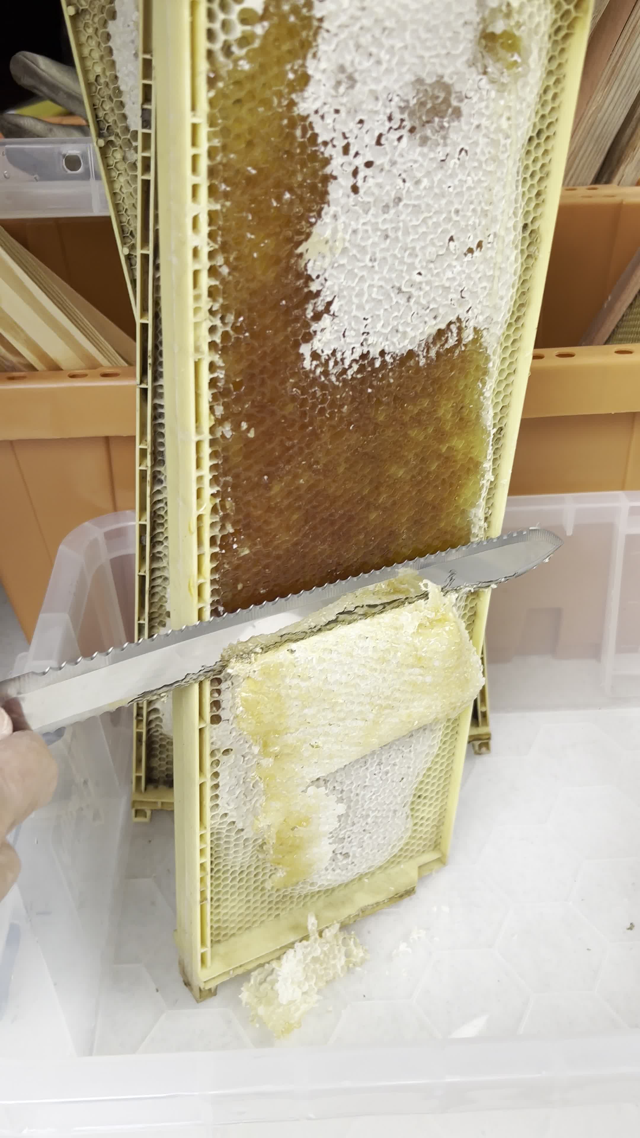 Cutting wax cappings off the frame